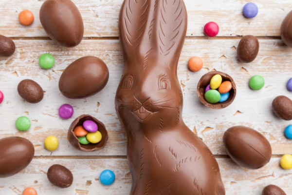 chocolate-easter-bunny-eggs-sweets-rustic-background