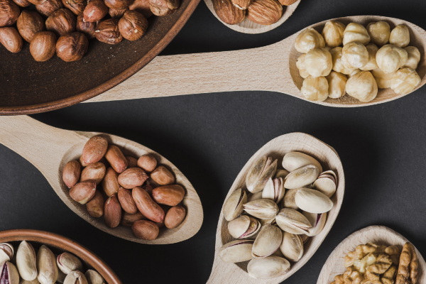 close-up-spoons-bowls-with-nuts