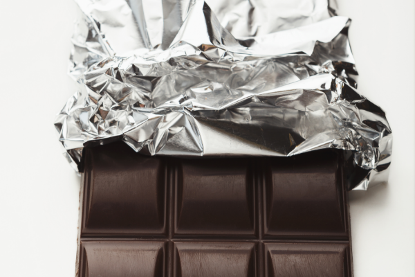 dark-chocolate-bar-half-foil-isolated-white-background-cutout